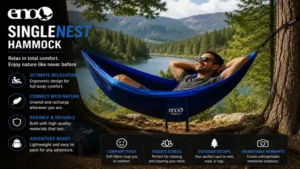 Person relaxing in an eno singlenest hammock beside a lake surrounded by nature