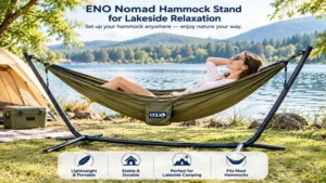 eno nomad hammock stand supporting a hammock beside a peaceful lakeside campsite